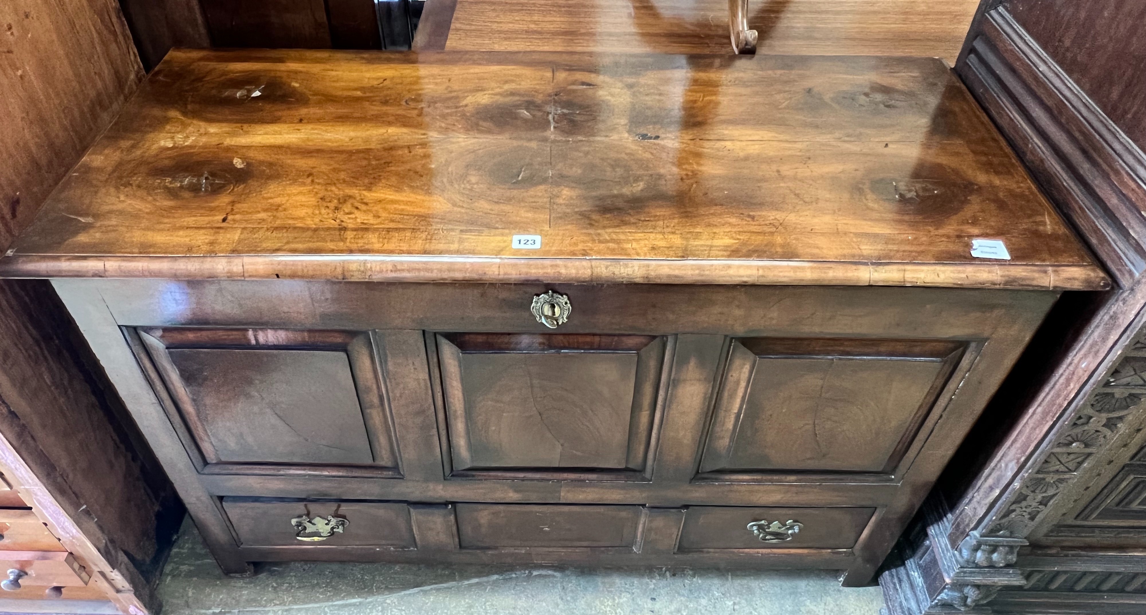 A Continental walnut mule chest, width 124cm depth 52cm height 78cm
